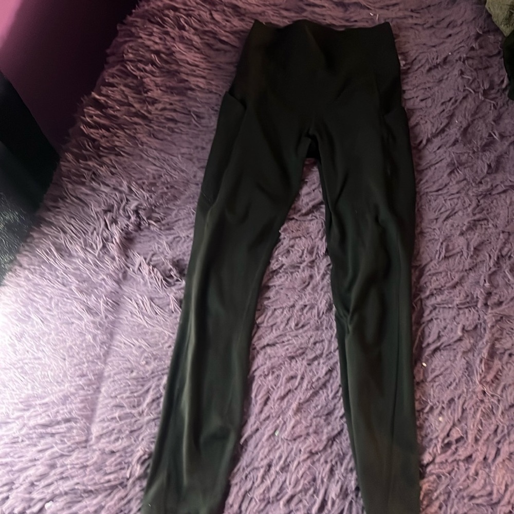 Women’s black Fabletics leggings with pockets